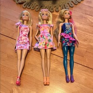 Set of Three Barbies in Vibrant Dresses